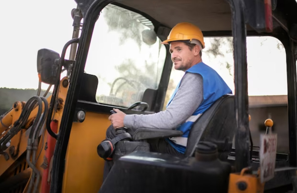Photo of a Commonwealth Waste Transportation machine operator Photo of a Commonwealth Waste Transportation machine operator